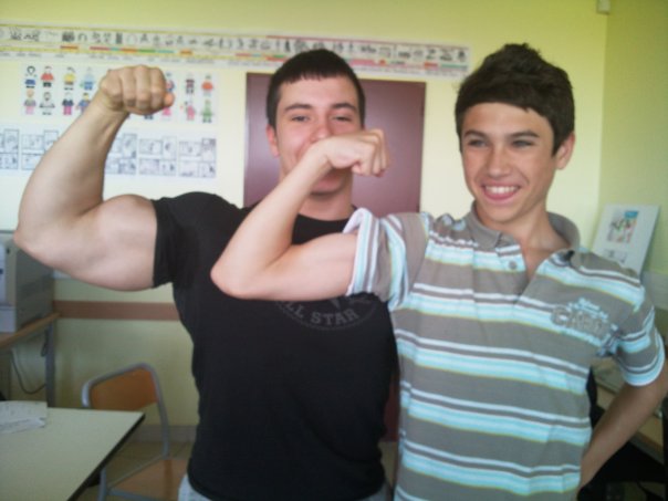 Lorenzo Becker before he got HUGE, comparing his biceps to a scrawny classmate.