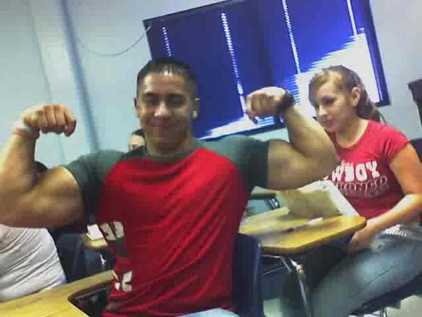 One of my favorite class room flexers. Massive guns & a double biceps pose. He is all that.