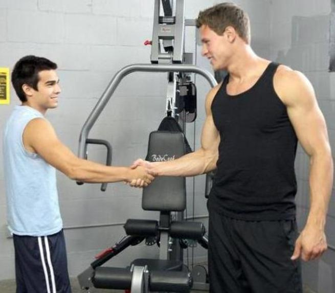 These two guys are meeting for the first time at the gym and the little guy looks lik...